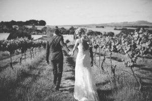 Black and White Photo of Married Couple in Vineyard | St Anne's Vineyard