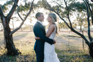 Married Couple Framed by Trees at St Anne's Vineyard