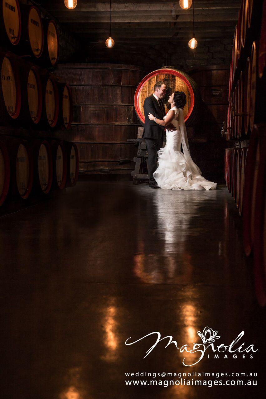 Photo of Just Married Couple in St Anne's Winery Cellar by Magnolia Images